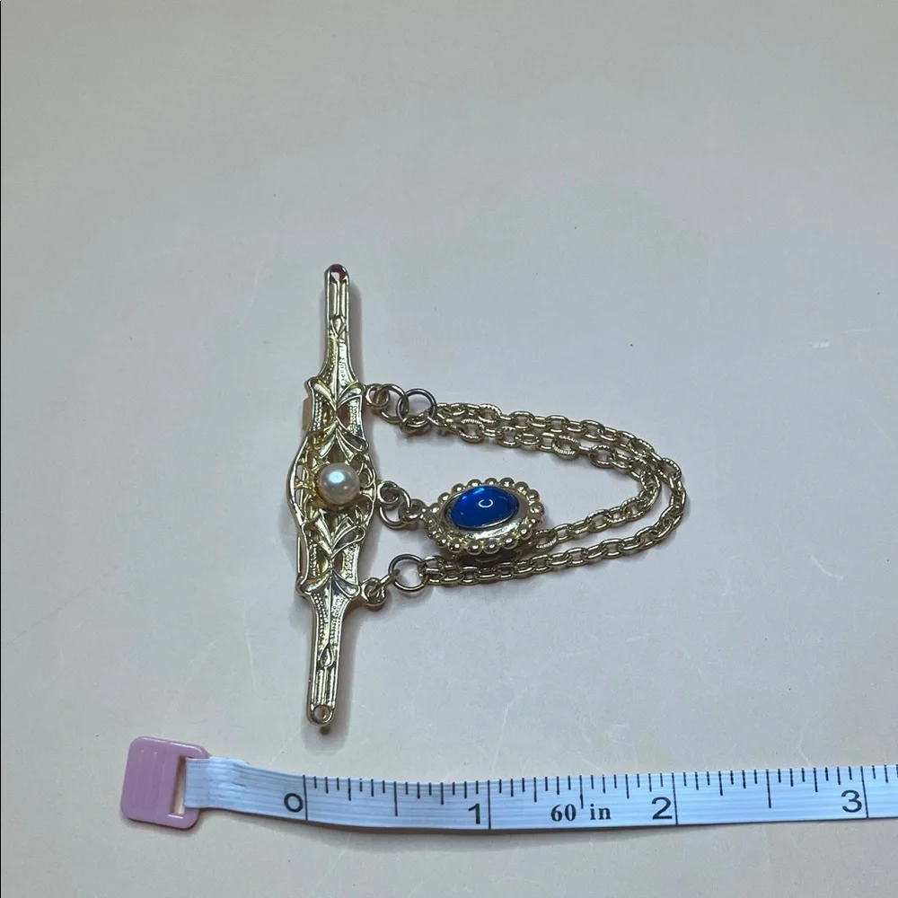 Elegant Gold and Blue Brooch Vintage